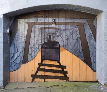 Painted garage door as a gallery with mine car, mining past, nostalgia, Goslar, Lower Saxony,