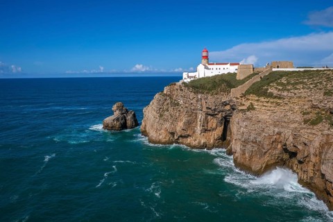 Sagres, Algarve, Portugal - Lighthouse at the Cap de Sao Vicente. Historical sight. Rocky headland