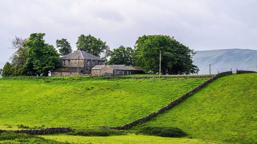 Farms over Upper Teesdale and River Tees, Forest-in-Teesdale village, County Durham and Cumbria,