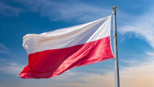 Flags, the national flag of Poland flutters in the wind