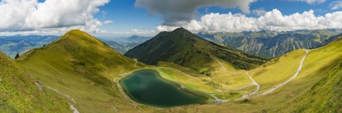 Riezler Alpsee, an artificial lake, snow pond, feeds the snow cannons that provide complete snow