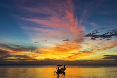 Longtail boat in sunset, sunset, horizon, evening light, boat, sun, evening mood, cloudy sky,
