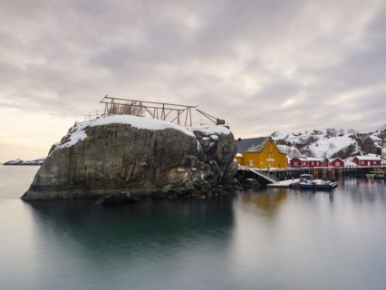 Large rock in the harbour of the authentic fishing village of Nusfjord, Flakstadøya, Lofoten,