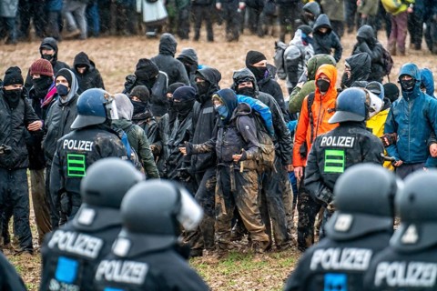 Violent clashes between thousands of demonstrators and the police, after a demonstration against
