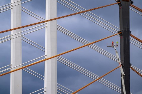 The new Rhine bridge Neuenkamp, the A40, white pillar ropes, and the old motorway bridge, which is