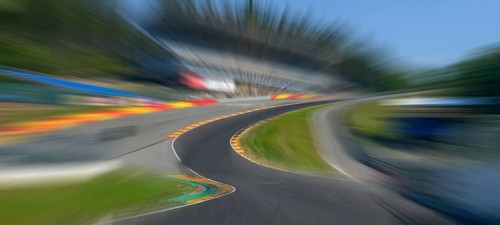 Panorama panoramic photo of Eau Rouge with dynamic speed effect from view tunnel view from racing