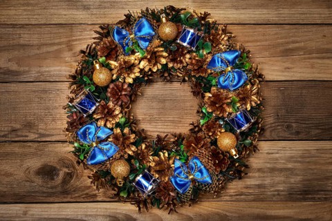 Christmas wreath on wooden background