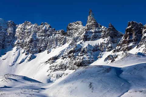 Snow-capped peaks of the Öxnadalur mountain range, near Akureyri, Northern Iceland Eyestra,
