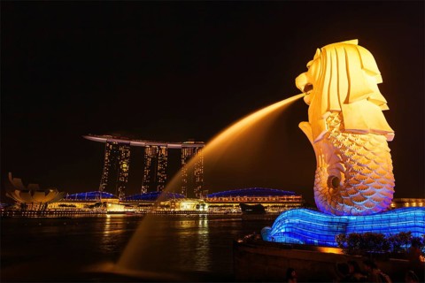SINGAPORE, JANUARY 1, 2014: Night view of Singapore Merlion at Marina Bay and Marina Bay Sand