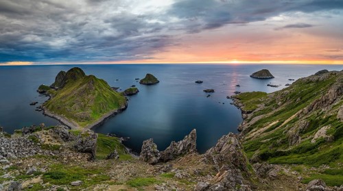 Rugged coastline with islands at sunset, Bufjellet, Nykvåg, Langøya Island, Vesterålen, Northern