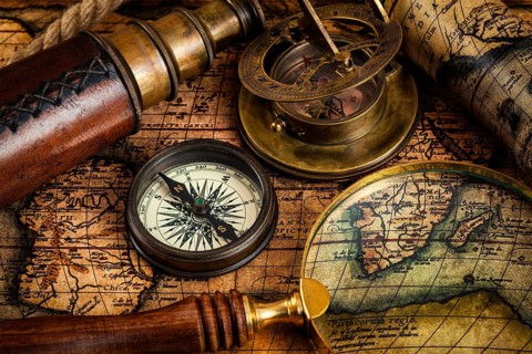 Travel geography navigation concept background, old vintage retro compass, sundial, magnifying