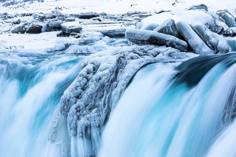 Godafoss waterfall, icy and snowy rock face, Northern Iceland Eyestra, Iceland, Europe