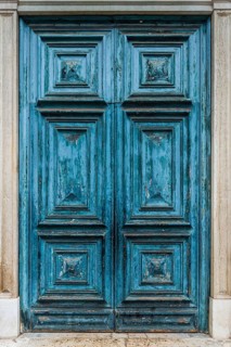 Old blue historic wooden door, dilapidated, withered, peeling, paint, craftsmanship