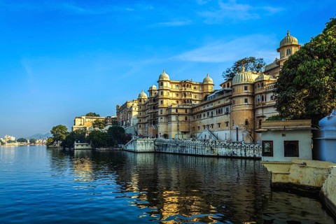 Romantic India luxury tourism concept background, Udaipur City Palace and Lake Pichola. Udaipur,