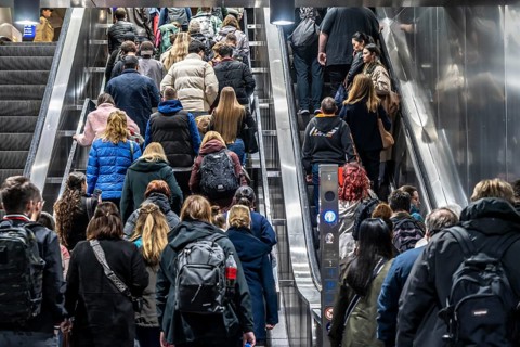 Public transport, underground, main station exit, many people crowding out of the underground
