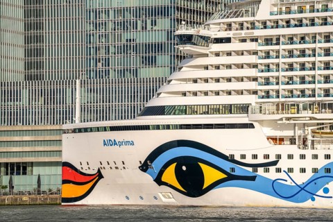 Rotterdam, skyline at the Nieuwe Maas, skyscrapers at the Kop van Zuid district, cruise ship Aida