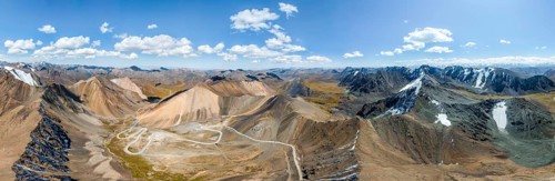Panorama, aerial view, road with serpentines, mountain pass in the Tien Shan, Chong Ashuu Pass,