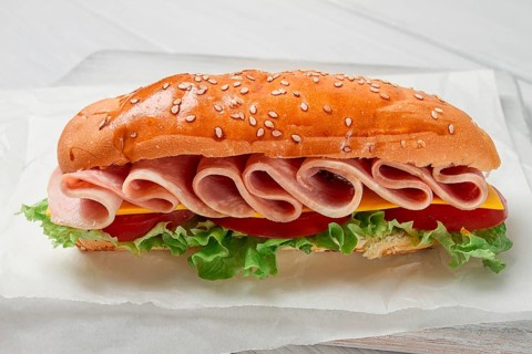 Sandwich submarine, on a white table, close-up, no people, horizontal, homemade
