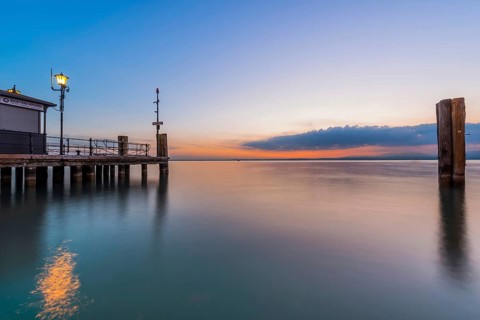 Evening atmosphere in the harbour, lake, water, tourism, travel, sunset, jetty, Lazise, Lake Garda,