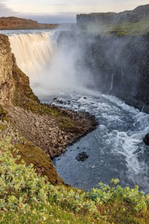 Large waterfall in a gorge, spray, rapids, summer, midnight sun, Dettifoss, North Iceland, Iceland,