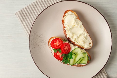 Sandwich, with cream cheese, homemade, on a cutting board, rustic style, no people, selective