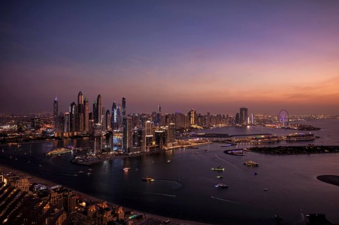 Night shot, view from The View At the Palm viewing platform of skyline with Princess Tower, Elite