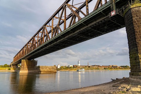 The railway bridge Duisburg-Hochfeld-Rheinhausen, over the Rhine, regional trains and many goods
