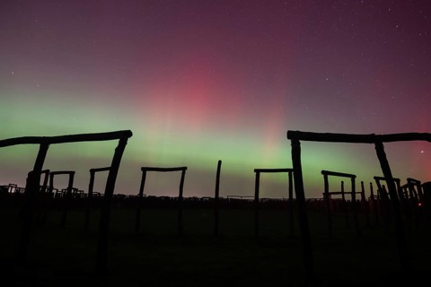 Northern lights (aurora borealis) over the ring sanctuary of Pömmelte, prehistoric circular ditch