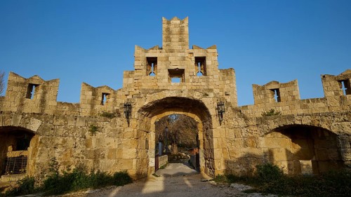 Ancient stone gate of a ruin with clear blue sky in the background, Tor Tor of Saint Paul, harbour