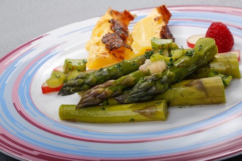 South German cuisine, green asparagus with rhubarb vinaigrette and potato gratin, healthy,