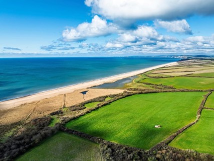 Farms over Swyre and West Bexington from a drone, West Bexington Nature Reserve, S W Coast Path,