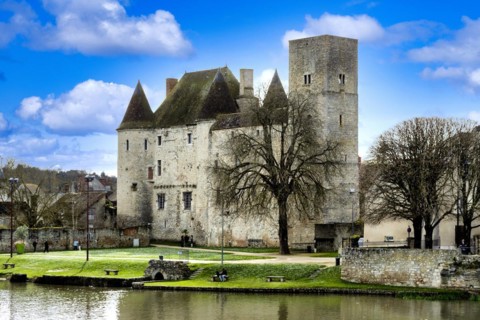 Nemours. Medieval castle of 12 century on river Loing. Seine-et Marne department. Ile-de-France.