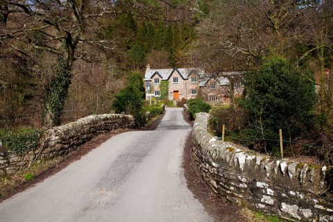 Packhorse bridge traditional village cottages, Brendon, Exmoor national park, Devon, England,