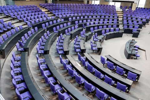 Empty plenary chamber in the German Bundestag, equipped with office swivel chairs in the special