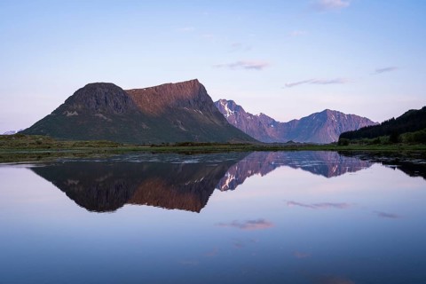 Landscape on the Lofoten Islands. Vagspollen bay, with Offersoykammen mountain behind it. The
