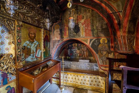 Magnificent interior of an Orthodox church with religious murals and icons, Inside the monastery,