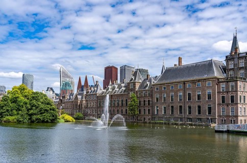 The historic Binnenhof, seat of the Dutch government, Hofvijver pond, skyline of the city centre at