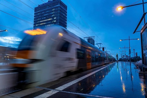 RRX train, regional express, Rhine-Ruhr-Express, train traffic, city centre skyline, Essen central