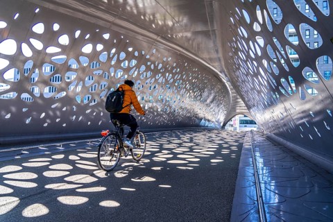 Light effects from the sun in the Parkbruk, a cycle and pedestrian bridge in the city centre of
