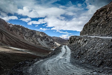 Dirt road in severe unpopulated Himalayas. Spiti valley, Himachal Pradesh, India, Asia