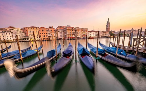 Venetian gondolas, boat dock at the customs office on the Grand Canal, Gondola Traghetto Dogana,