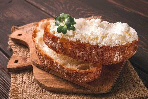 Sandwich, with cream cheese, homemade, on a cutting board, rustic style, no people, selective