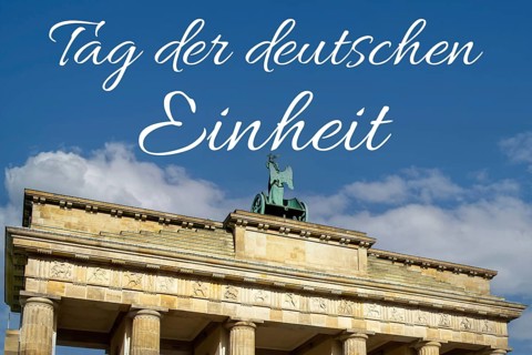 Brandenburg Gate in Berlin with lettering DAY OF GERMAN UNITY