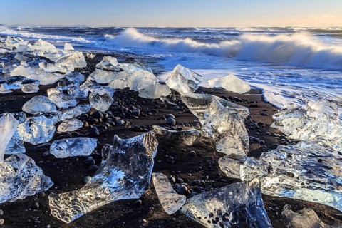 Ice floes on the beach, waves, sea, sunny, morning light, winter, Diamond Beach,