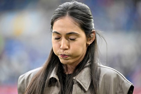 DAZN sports presenter Ann-Sophie Kimmel portrait, blows cheeks open, pressure, stress, tension,