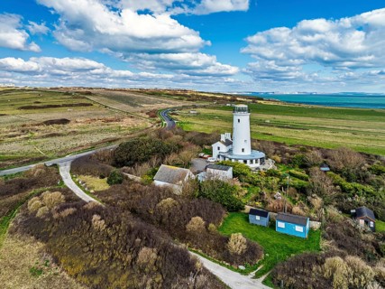 Portland Bird Observatory from a drone, Bill Lighthouse, Portland Bill, Isle of Portland, Dorset,