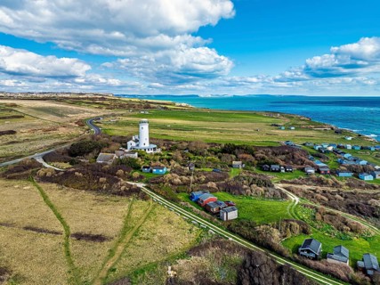 Portland Bird Observatory from a drone, Bill Lighthouse, Portland Bill, Isle of Portland, Dorset,