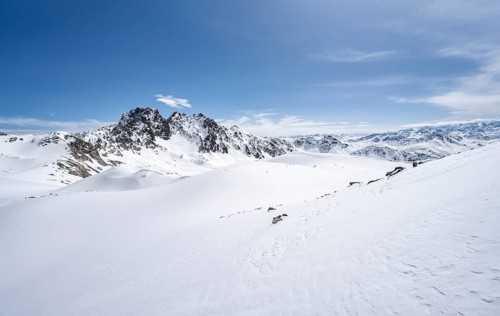 View of mountain peaks of the Bernina group, mountain landscape with snow, ascent to the