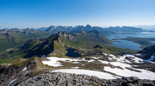 View of mountains and fjord landscape, mountain panorama, at the summit of Rundfjellet, lake