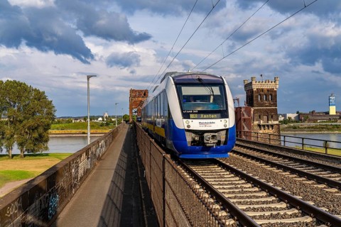 The railway bridge Duisburg-Hochfeld-Rheinhausen, over the Rhine, regional trains and many goods